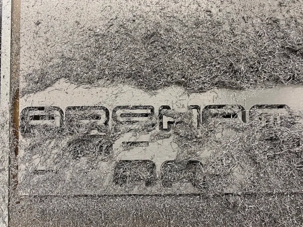 Machined lettering detail made for Daniel Arsham