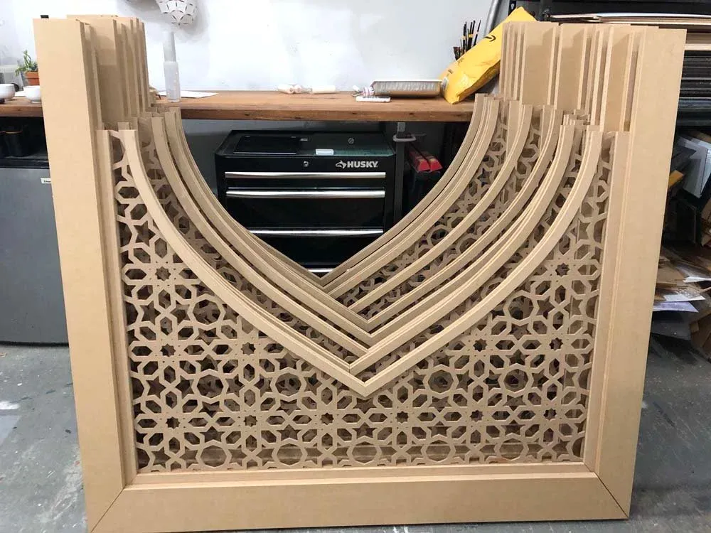 Arabesque detailed archways CNC-routed in MDF for an event space