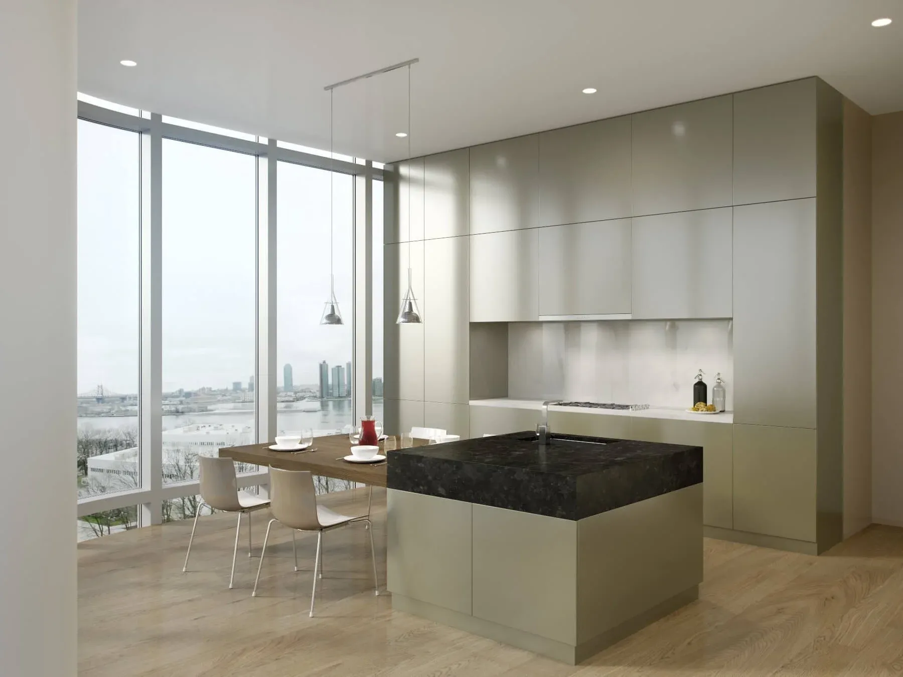 Modern kitchen interior with a city view, floor-to-ceiling windows, and a black stone island, designed by DIVISION Architecture